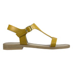 Sandalo artigianale donna in pelle giallo ocra con cinturino a T – vista laterale – Cristhàlia Made in Italy