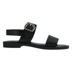 Sandalo piatto pelle nera doppia fascia fibbia oversize argento – vista laterale destra – Cristhàlia