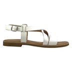 Sandalo flat bianco con fasce incrociate in pelle – vista laterale – Cristhàlia