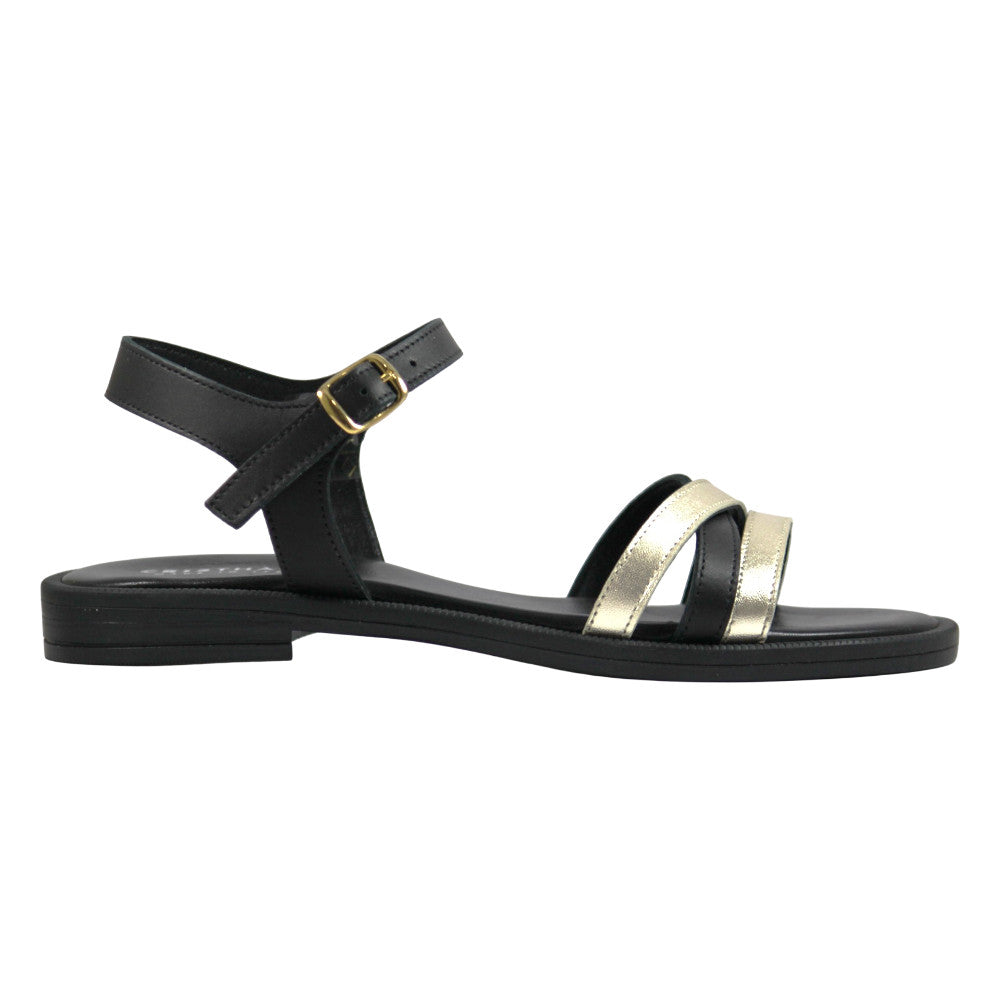Sandalo flat donna in pelle nera con fasce incrociate laminato oro e fibbia oro - vista laterale