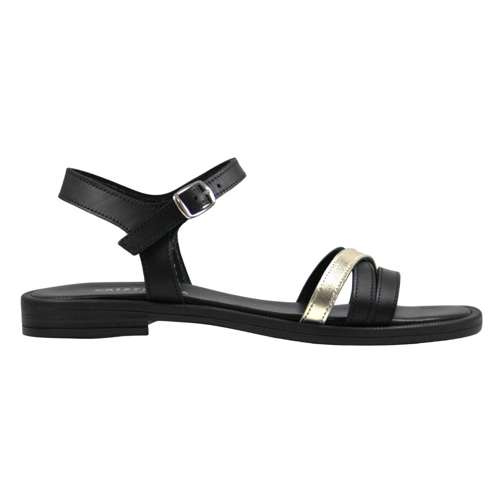 Sandalo flat donna in pelle nera con fasce incrociate laminato oro e cinturino alla caviglia - vista laterale