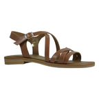 Vista tre quarti sandalo flat donna pelle cuoio fascette incrociate suola beige sabbia – Cristhàlia